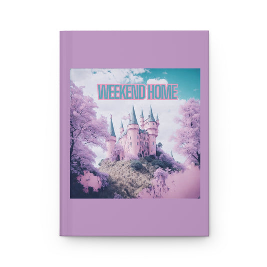 Purple notebook with a pink castle and funny 'Weekend Home' text written in pink and pastel blue letters