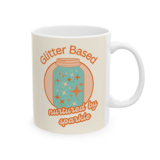 mug with a jar filled with orange glitter illustration and a text that says "glitter based" "nurtured by sparkle"