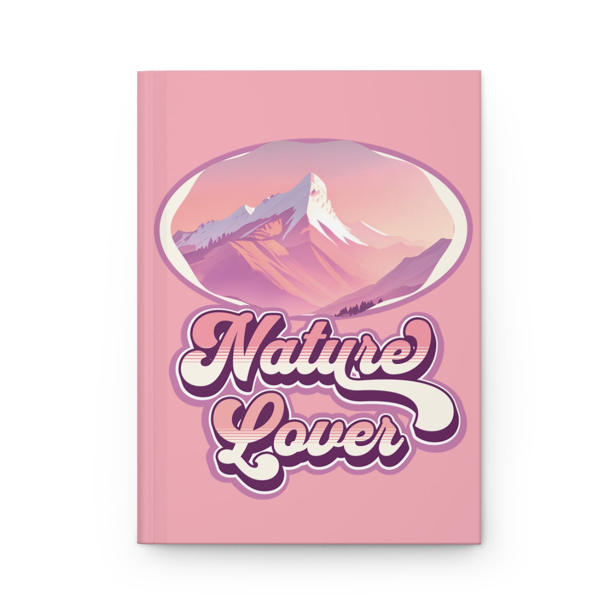 Pastel pink notebook with retro groovy style 'Nature Lover' text written in purple and pink, and a pink mountain illustration