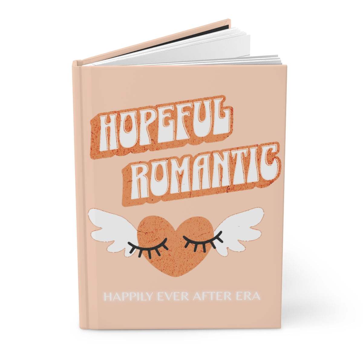 Notebook with 'Hopeful Romantic' text written in orange retro aesthetic letters and an orange heart with white wings and eyelashes design and "happily ever after era" text in white neon letters underneath