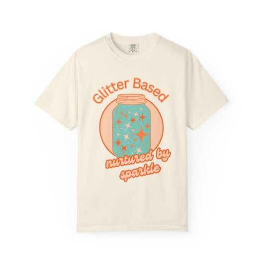 Beige t-shirt with an orange and mint colored graphic design of a jar and retro style text 