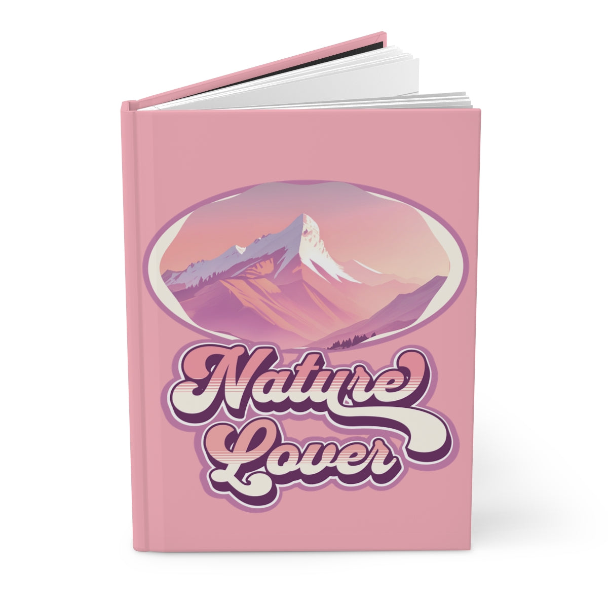 Pastel pink notebook with retro groovy style 'Nature Lover' text written in purple and pink, and a pink mountain illustration