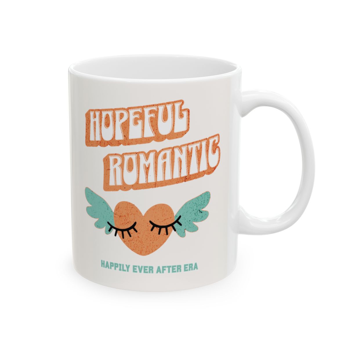 White mug with orange retro style 'Hopeful Romantic' text and an orange heart with mint colored wings design 
