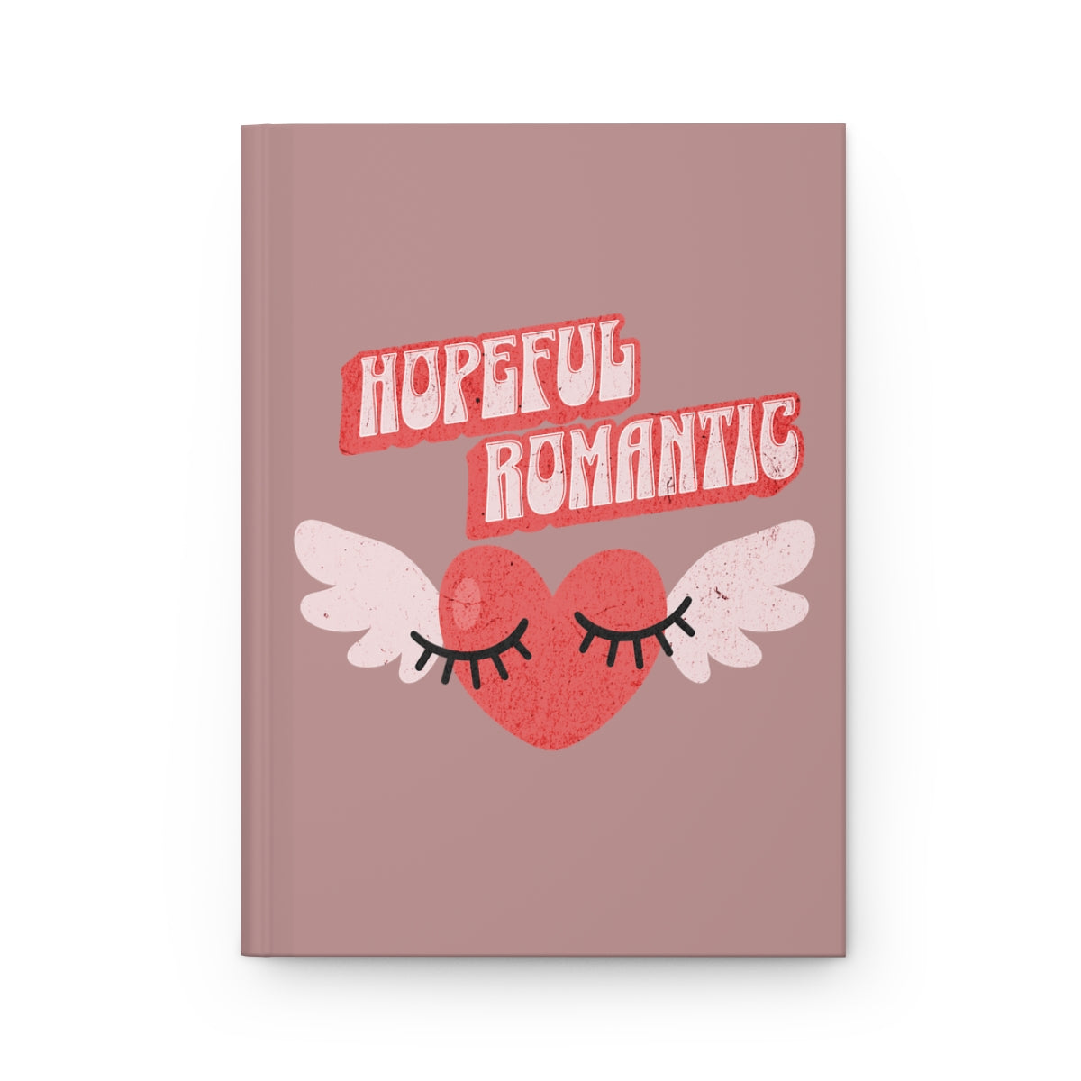 Notebook with 'Hopeful Romantic' text written in red vintage style letters and retro aesthetic heart with wings and flirty eyelashes design 